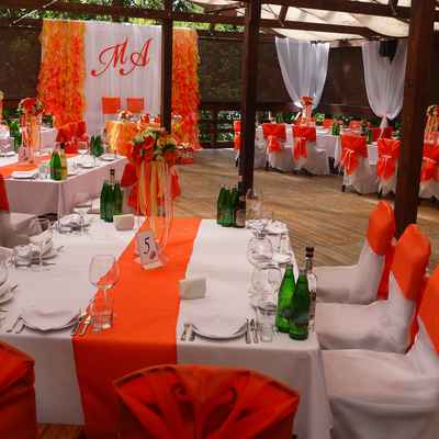 Autumn orange wedding reception decor