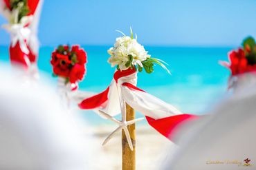 Beach red wedding ceremony decor