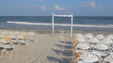 Beach white wedding ceremony decor