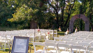 Outdoor white wedding ceremony decor