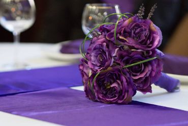 Purple rose wedding bouquet