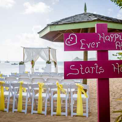 Outdoor pink wedding signs