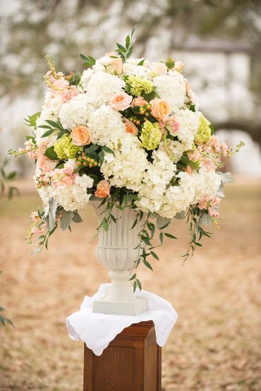 Outdoor white wedding floral decor