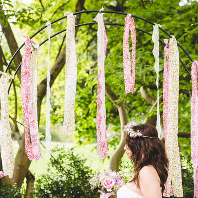 Outdoor pink wedding photo session decor