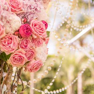 Outdoor pink wedding floral decor