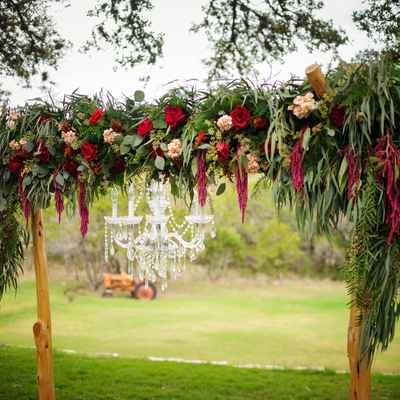 Outdoor red wedding ceremony decor