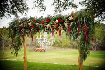 Outdoor red wedding ceremony decor