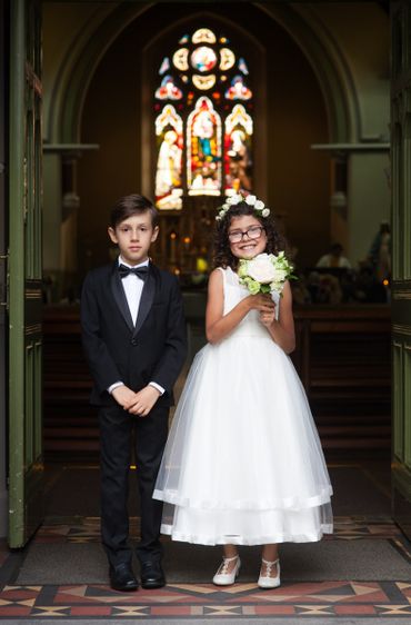 White overseas kids at wedding