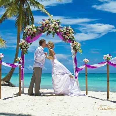 Beach purple wedding ceremony decor